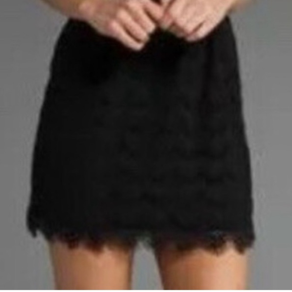 Free People Black Lace mini Skirt. Lined. Side zip. Women size 2.